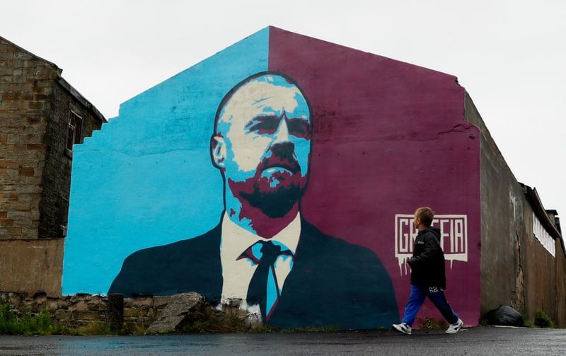football players mural painting in world cities