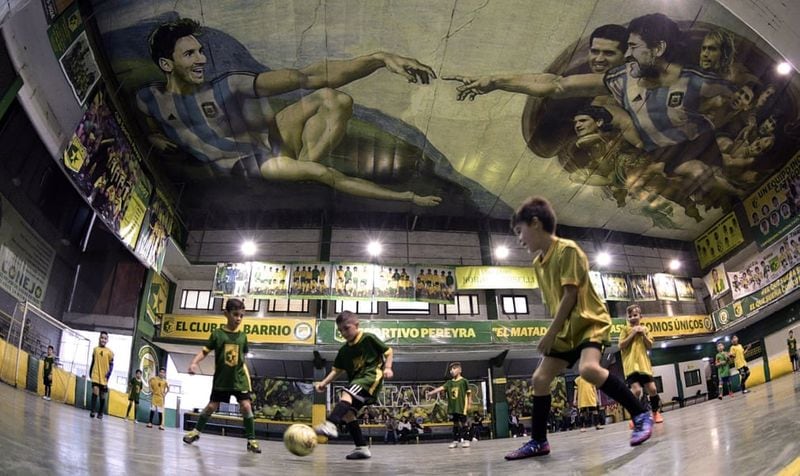 football players mural painting in world cities
