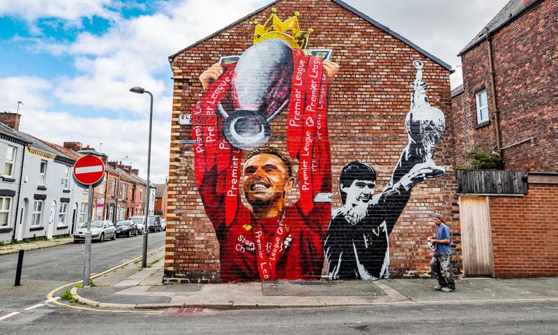 football players mural painting in world cities