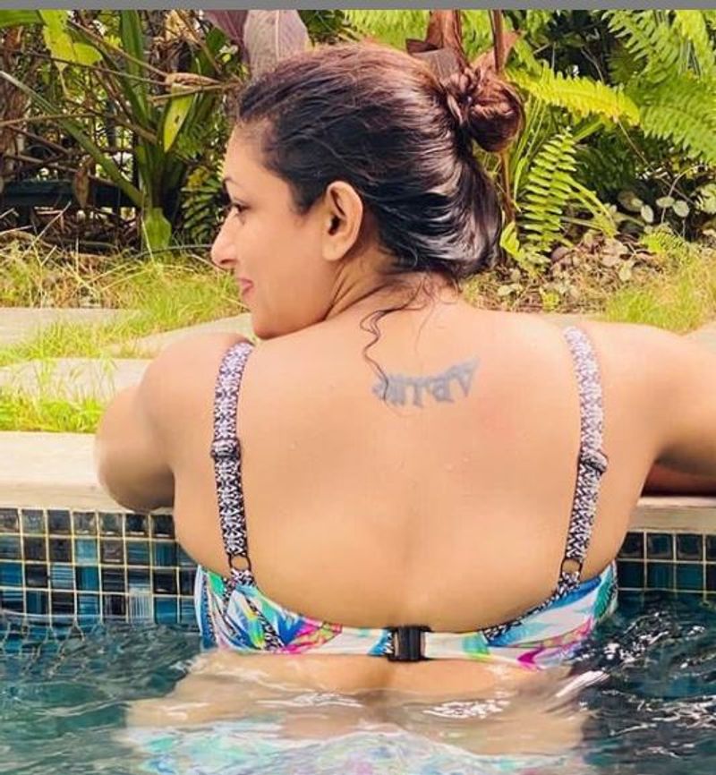 actress malavika latest hot swimming pool photo gallery