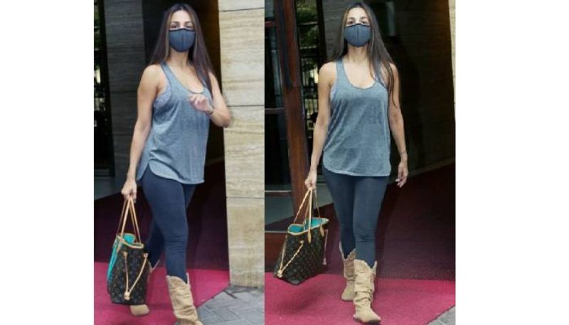 Malaika Arora in basic tee and pants with Rs 1.2 lakh bag