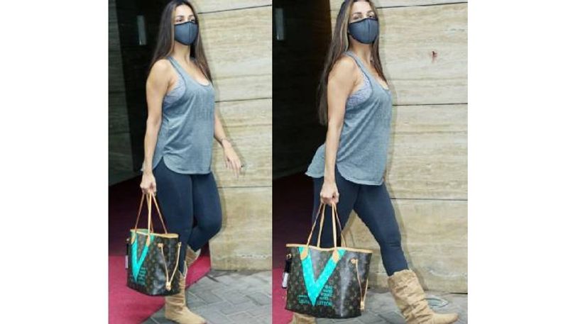 Malaika Arora in basic tee and pants with Rs 1.2 lakh bag