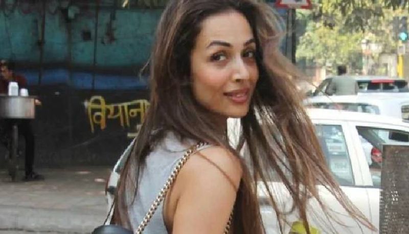 Malaika Arora in basic tee and pants with Rs 1.2 lakh bag
