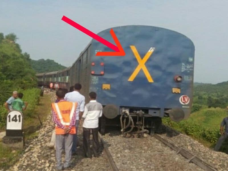 What is the secret of X cross mark on last boggy of trains in India