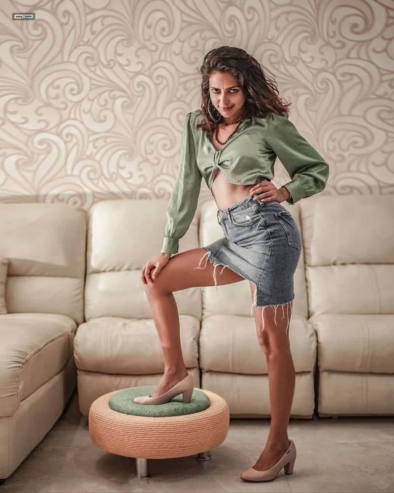 Actress Amala Paul hanging yoga photo going viral in social media