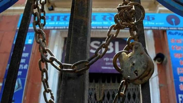 Banking services take a hit as 9 lakh employees go on two-day nationwide strike from today-dnm Banking services take a hit as 9 lakh employees go on two-day nationwide strike from today-dnm