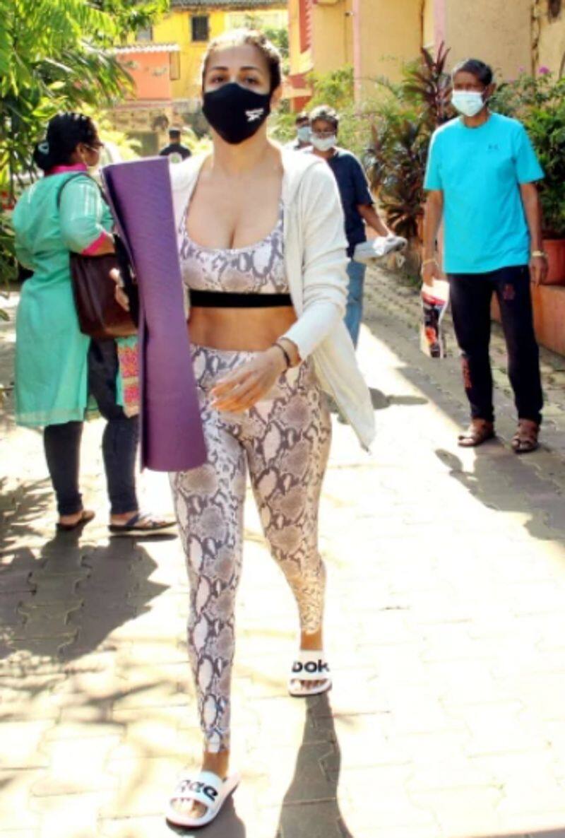Malaika Arora in sports bra and tights with Rs 3k slippers goes for yoga class dpl