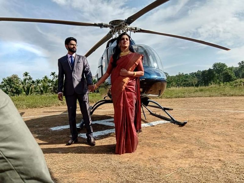 bride arrived in helicopter to attend the wedding at Wayanad Pulpally