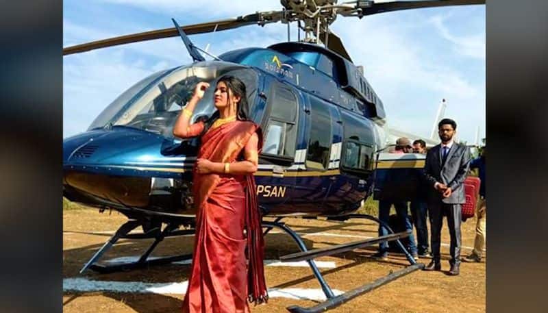 Kerala bride arrives in helicopter for wedding-tgy