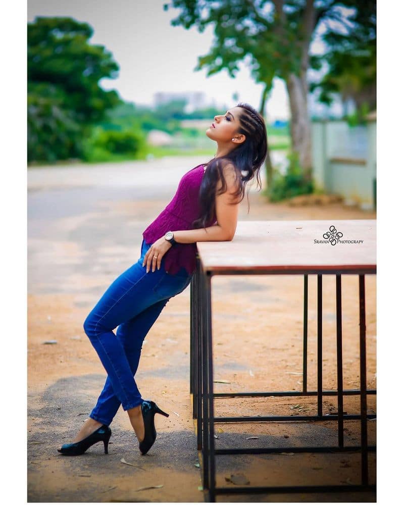 anchor rashmi gautham stuns in purple color top and tight jeans ksr
