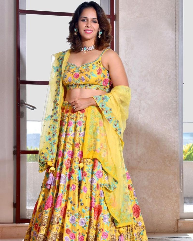 Indian badminton star saina nehwal navel show in lehenga, Saina shares in social media CRA