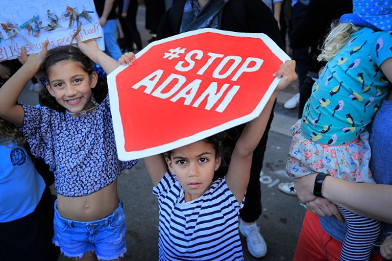 india vs australia 2020 stop adani protesters run on sydney pitch to interrupt 1st odi see photos kpt