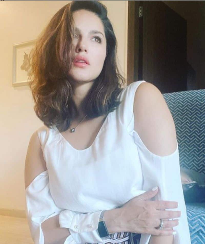 Sunny Leone looks beautiful in cold shoulder white crop top in Mumbai dpl