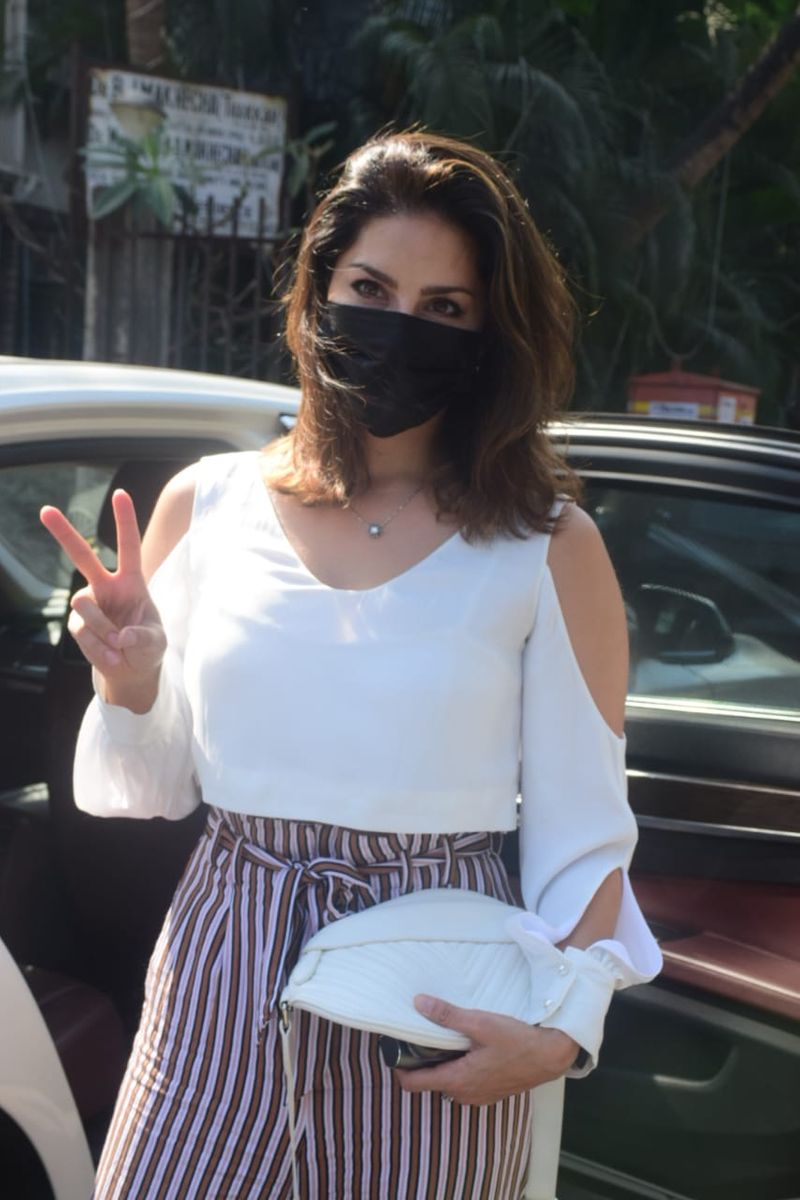 Sunny Leone looks beautiful in cold shoulder white crop top in Mumbai dpl