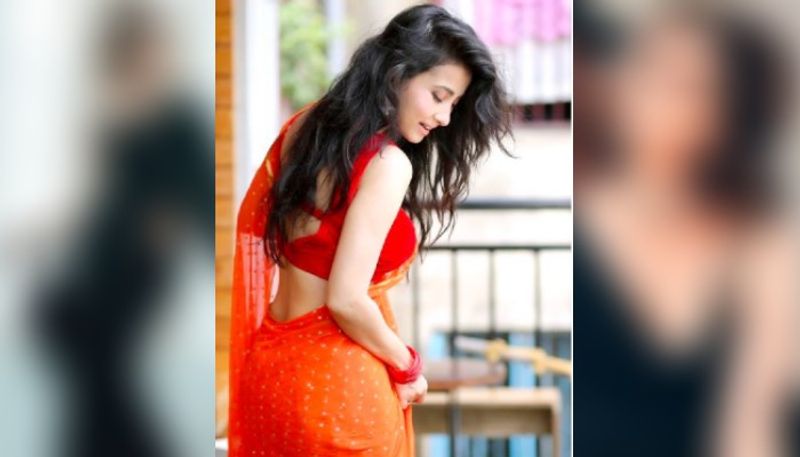 Monami Ghosh oozes oomph in a Orange saree ADB