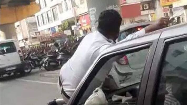 two cars collided, woman droves car for one kilometre with the man on her car bonnet two cars collided, woman droves car for one kilometre with the man on her car bonnet