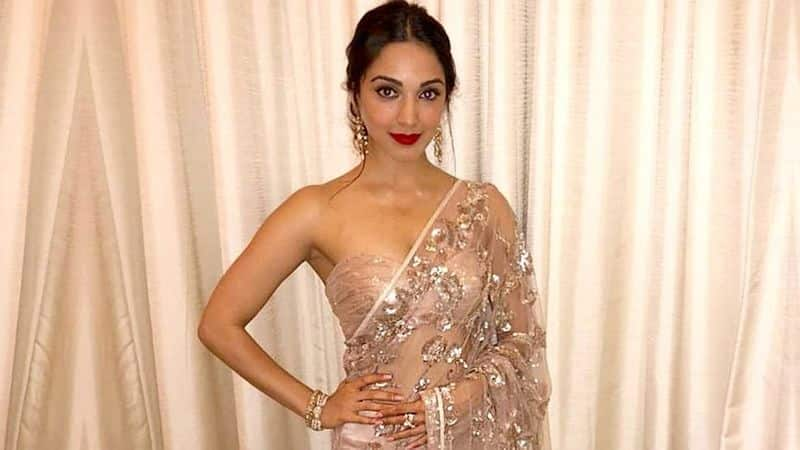 kiara advani in sheer nude sari strapless blouse earrings 866x487 jpg