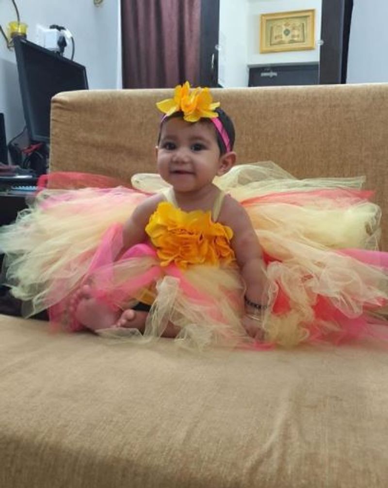 alya manasa daughter aila cute angle dress up photos