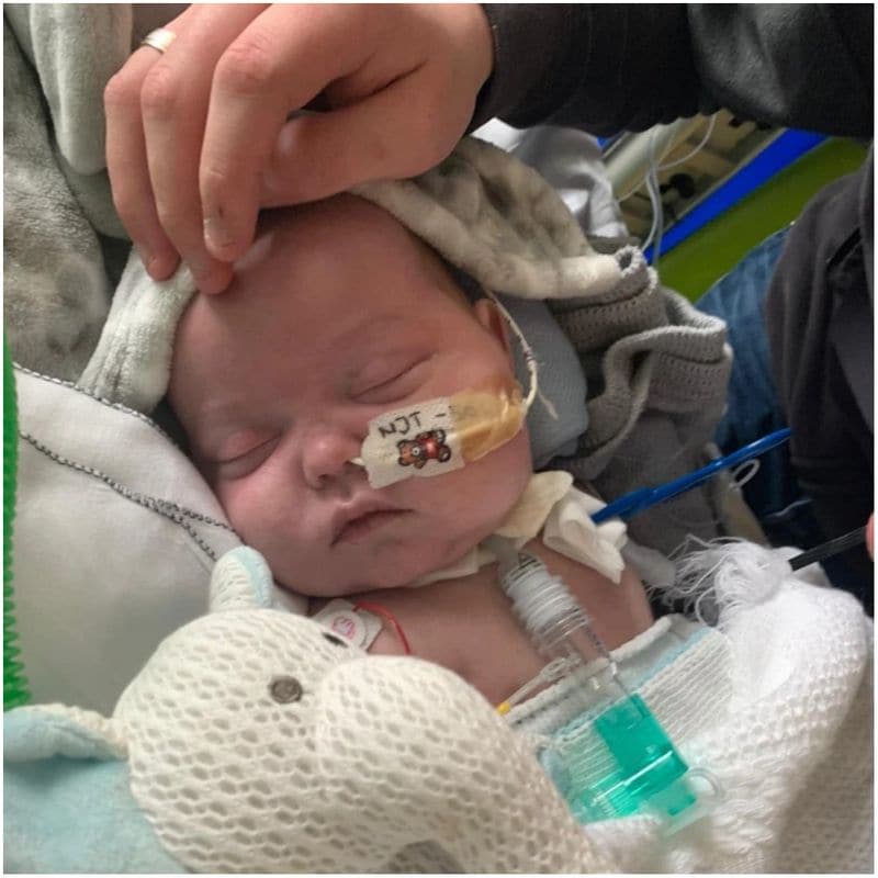 Baby who survived five cardiac arrests returns home to celebrate his first Christmas