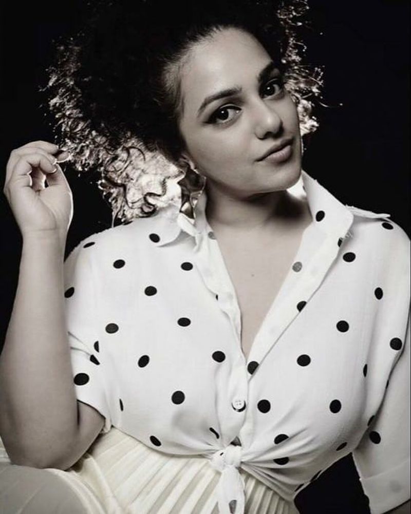 nithya menon bed glamoure photos viral arj