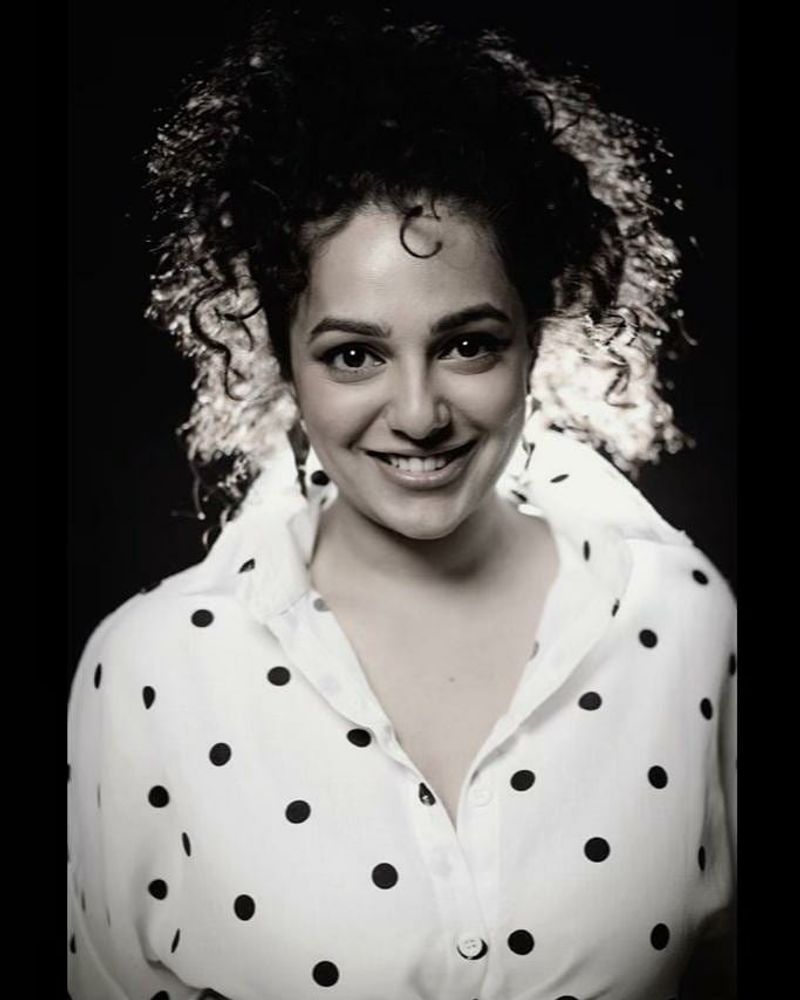 nithya menon bed glamoure photos viral arj