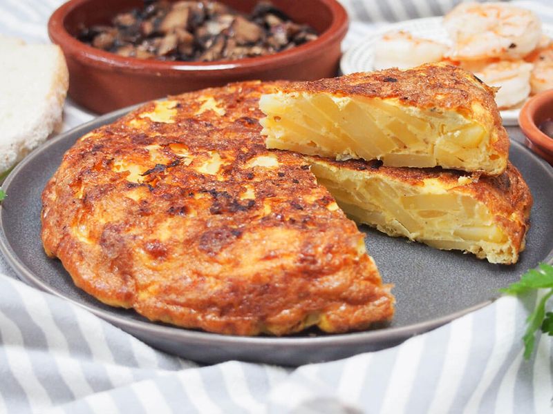 Bread Crumbs Omelette: Bread toast with omelette is a great way to start your day. It's a high-carb and high-protein meal, fit for breakfast. To make this perfect meal handy to eat, try adding some bread crumbs or bread slices cut in squares on top of your omelette to enjoy your favourite breakfast on the go.