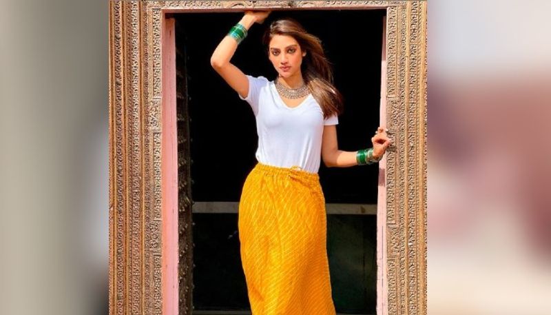 <p>নিজেকে ধরে রাখতে শরীরচর্চার দিকে কড়া নজর দিয়ে থাকেন নুসরত, তা তাঁর ফিগার দেখলেই বুঝে নেওয়া খুব সহজ। </p>