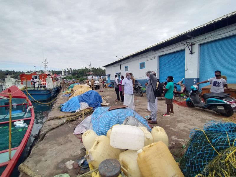 Sand dredging lobster workers protest in sea at Kovalam