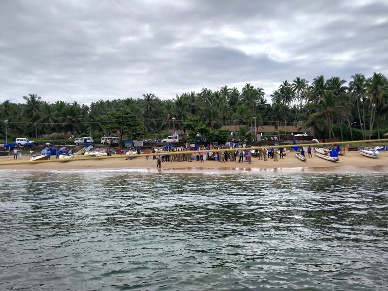 Sand dredging lobster workers protest in sea at Kovalam