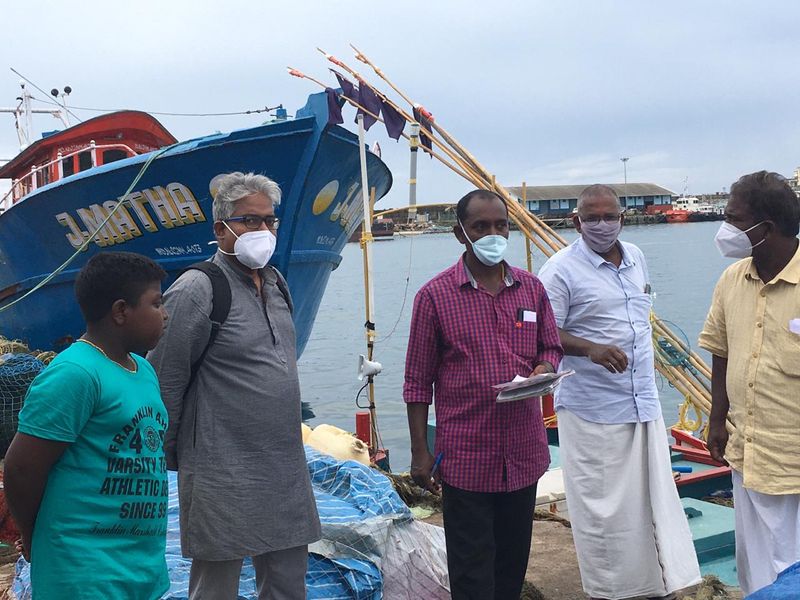 Sand dredging lobster workers protest in sea at Kovalam