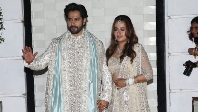 Varun Dhawan- Natasha Dalal
The love birds tied their knot recently on January 24, and on their D-Day, they donned in colour coordinated outfits. They opted for the colour ivory and looked gorgeous on their wedding night.
