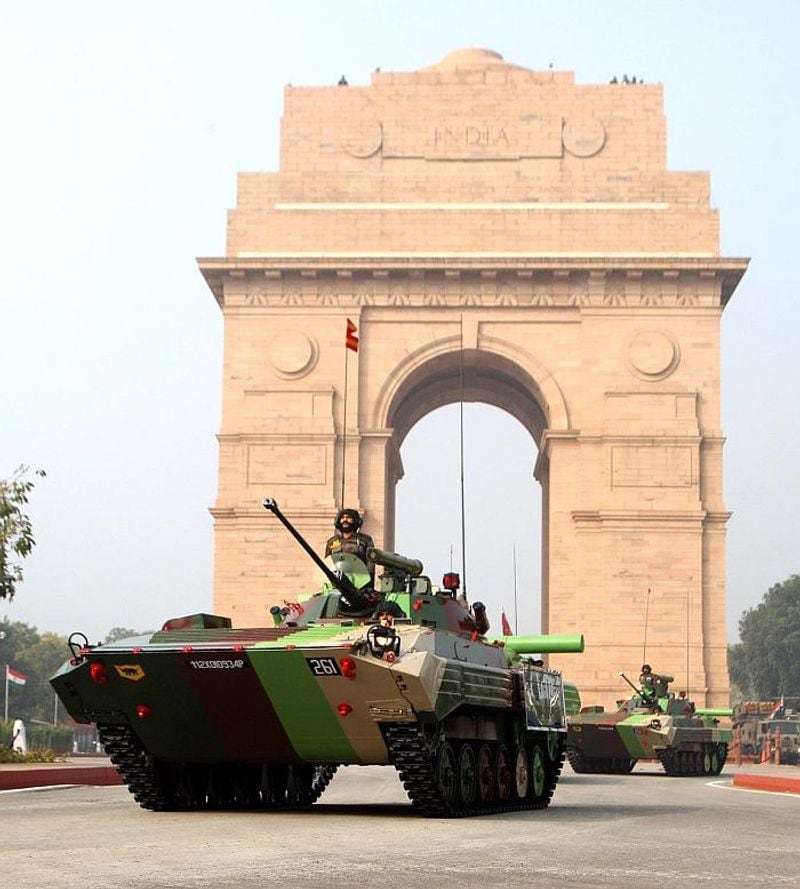 Ballway Machine Pikate(BMP-II)
The Infantry Combat Vehicle (ICV) BMP-II, Sarath is a high mobility Infantry combat Vehicle with potent armament and state of the art night fighting capability. It will be led by Capt Akshay Rastogi of the 3rd Battalion Brigade of the Guards (1st Rajputana Rifles).
BMP is fitted with a 30-millimetre Automatic Gun, 7.62 mm PKT Machine Gun and extremely accurate Konkurs Missile.
The ICV of Indian Army has recently been upgraded with Thermal Imaging Sight Kit (TISK) which gives it a capability to destroy any unknown enemy target up to a distance of four Kilometers at night. It is one of the best amphibious fighting vehicles in the world.