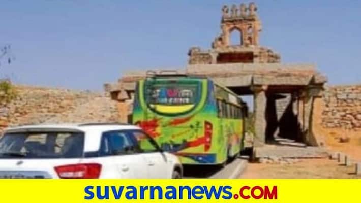 Tourist Bus Travel Using Haresankara Dwar Door at Hampi in Vijayanagara grg Tourist Bus Travel Using Haresankara Dwar Door at Hampi in Vijayanagara grg