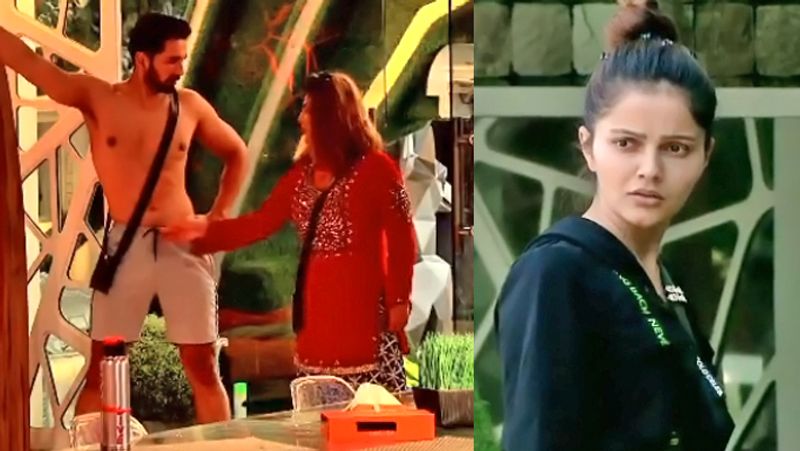अभिनव के प्यार में पागल राखी ने हाल ही में ऐसी हरकत कर दी, जिसे देख रुबीना भड़क उठीं। रुबीना ने सख्त लहजे में राखी को चेतावनी भी दे डाली है। दरअसल, बिग बॉस में राखी सावंत बरमूडा (हाफ पैंट) में खड़े अभिनव शुक्ला के पास जाती हैं और उनका नाड़ा खींच देती हैं। ये देख अभिनव हैरान रह जाते हैं। हालांकि राखी की इस हरकत से अभिनव की पत्नी रुबीना दिलैक भड़क जाती हैं।
