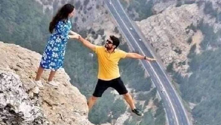 Couple Poses On Cliffs Edge In Viral Pic Couple Poses On Cliffs Edge In Viral Pic