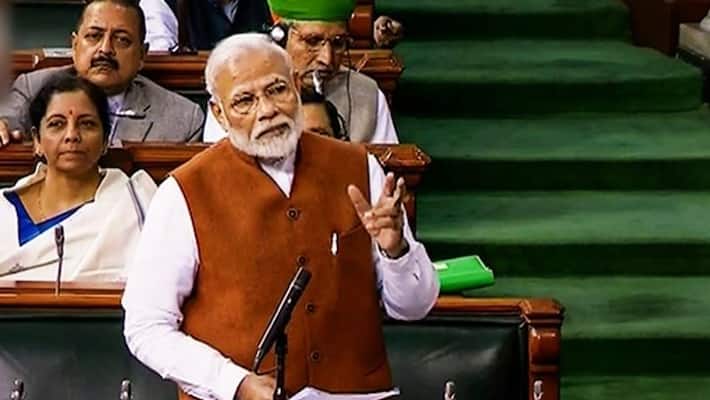 Lok Sabha adjourned till 2 pm amid uproar by Opposition MPs during PM Modi's speech-dnm Lok Sabha adjourned till 2 pm amid uproar by Opposition MPs during PM Modi's speech-dnm
