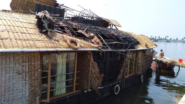house boat catches fire in alappuzha house boat catches fire in alappuzha