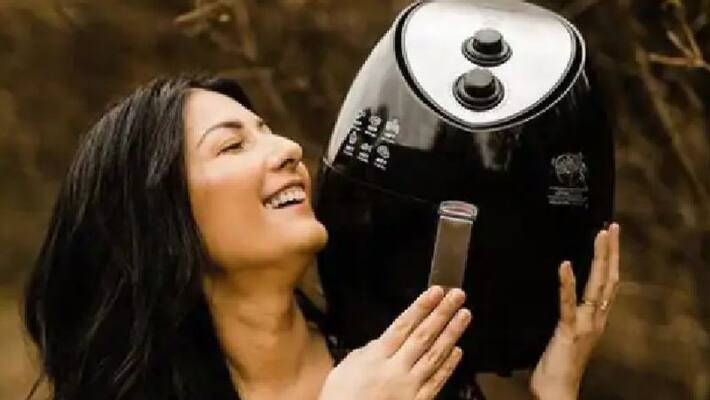 womans romantic photoshoot with air fryer womans romantic photoshoot with air fryer