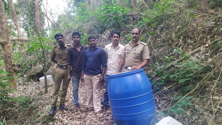 900 liter wash collection was found and destroyed at Poovan hill in Thamarassery 900 liter wash collection was found and destroyed at Poovan hill in Thamarassery