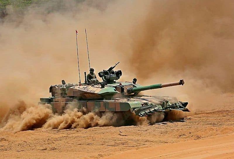 Prime Minister Narendra Modi hands over the Arjun Main Battle Tank