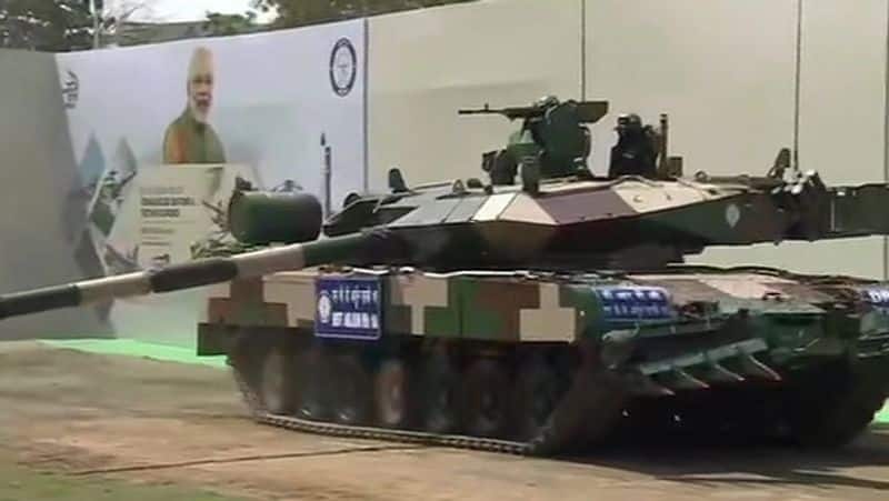 Prime Minister Narendra Modi hands over the Arjun Main Battle Tank