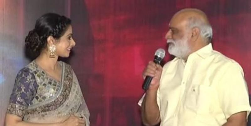 దర్శకుడు రాఘవేంద్రరావుతో వేడికపై మాట్లాడుతూ