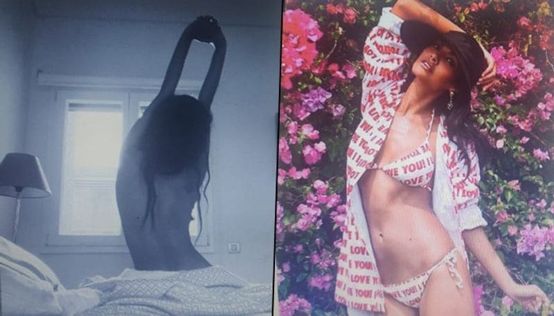 Bollywood actress Esha Gupta took to Instagram to share a mirror selfie. She clicked the image in her bedroom; Esha was seen in a black sports bra and white track pants. 