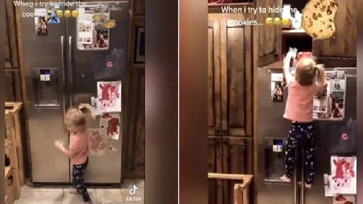 little girl Climbing Fridge to Grab Cookies video viral little girl Climbing Fridge to Grab Cookies video viral