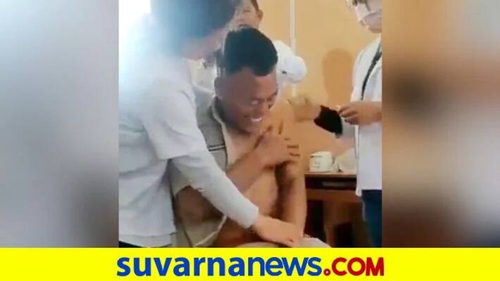 Video Of Nagaland Cop Laughs While Vaccinating Goes Viral Video Of Nagaland Cop Laughs While Vaccinating Goes Viral
