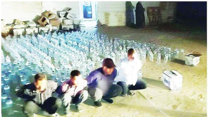 four asians arrested for bootlegging in kuwait four asians arrested for bootlegging in kuwait