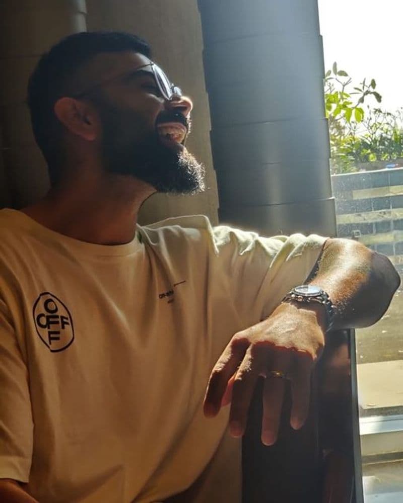 Recently, he shared a photo, which resembles his humbleness. In the picture, he is seen wearing his glasses and a white t-shirt, as he shares a laugh, while he captioned it, "Fake candid shot 📸".