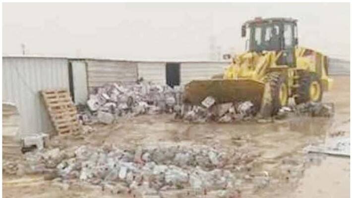 locally made liquor and raw materials seized from labour accommodations in kuwait locally made liquor and raw materials seized from labour accommodations in kuwait