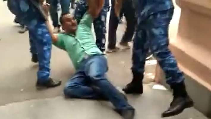 Uproar over Bihar Police Bill cops manhandle MLAs in assembly-VPN Uproar over Bihar Police Bill cops manhandle MLAs in assembly-VPN