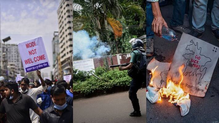 police fires tear gas against anti modi protesters in Dhaka Bangladesh police fires tear gas against anti modi protesters in Dhaka Bangladesh